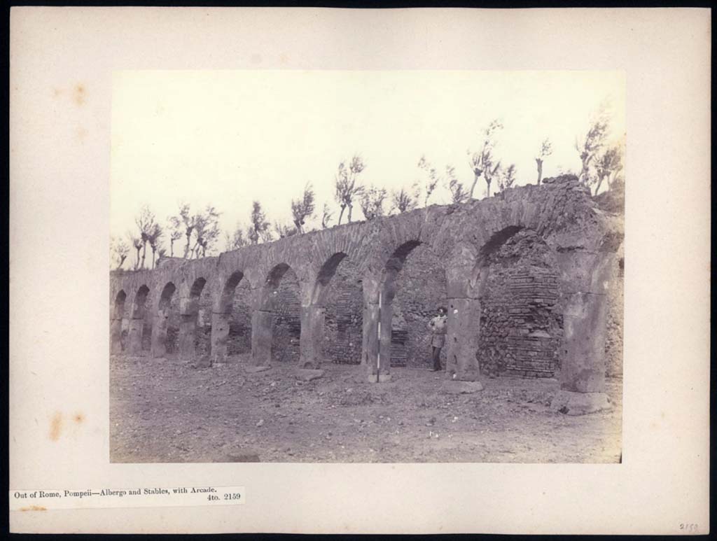 Via dei Sepolcri, east side. 1869-1877. Photo titled "Pompeii - Albergo and stables with arcade".
Photo  British School at Rome, Parker Collection, call number JHP[PHP]-2159. CC BY-NC-ND 4.0