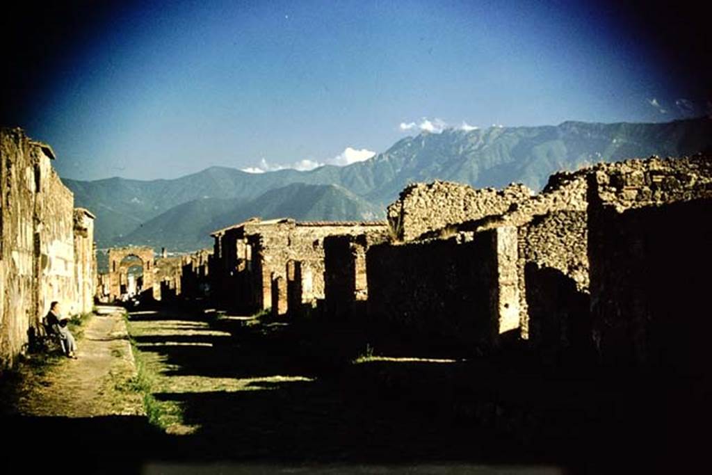 Via di Mercurio, Pompeii. 1959. Looking south from near VI.9.6/7. Tatiana Warscher is sitting on the left. Photo by Stanley A. Jashemski
Source: The Wilhelmina and Stanley A. Jashemski archive in the University of Maryland Library, Special Collections (See collection page) and made available under the Creative Commons Attribution-Non-Commercial License v.4. See Licence and use details.
J59f0233
