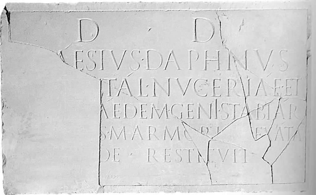 Stabiae Temple of the Genius Stabianum. Tablet with inscription.
The Epigraphic Database Roma records:
D(ecreto) d(ecurionum).
[- C]aesius Daphnus,
[Augus]tal(is) Nuceriae et
[---], aedem Genì Stabiar(um),
[delapsi]s marmọṛị[b(us)] [v]exata 
[ae]de, restituit.      [CIL X 772]
Now in Naples Archaeological Museum. Inventory number 3704.
