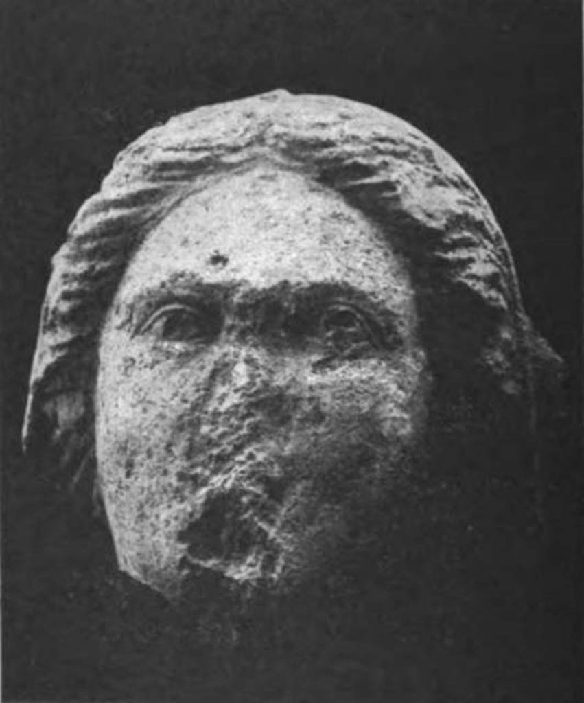 Pompeii Fondo Azzolini. Head, part of the remains of a feminine statue.
The head is part of the remains of a feminine statue of tufa, of which were found only a few scattered fragments.
See Notizie degli Scavi di Antichità, 1916, p. 300, fig. 13.


