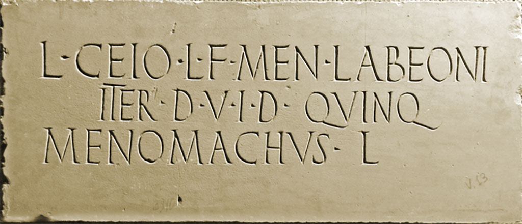 HGE38 Pompeii. According to Kockel, on the 20th April 1813 a marble plaque with remains of stucco on the edges was found at the side of the tomb. 
He attributes it to HGE39. Eschebach attributes it to HGE38. It had the inscription 

L CEIO L F MEN LABEONI
ITER D V I D QVINQ
MENOMACHVS L

According to Epigraphik-Datenbank Clauss/Slaby (See www.manfredclauss.de) this read

L(ucio) Ceio L(uci) f(ilio) Men(enia) Labeoni 
iter(um) d(uum)v(iro) i(ure) d(icundo) quinq(uennali)
Menomachus l(ibertus)       [CIL X 1037]
