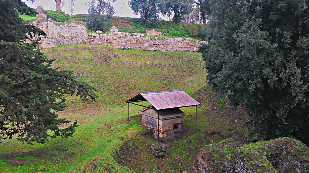 City walls and Tower III, from Via delle Tombe. 2017/2018/2019. 
Tomb 34aEN, aedicula tomb on a podium. Looking north from Via delle Tombe. Photo courtesy of Giuseppe Ciaramella.
