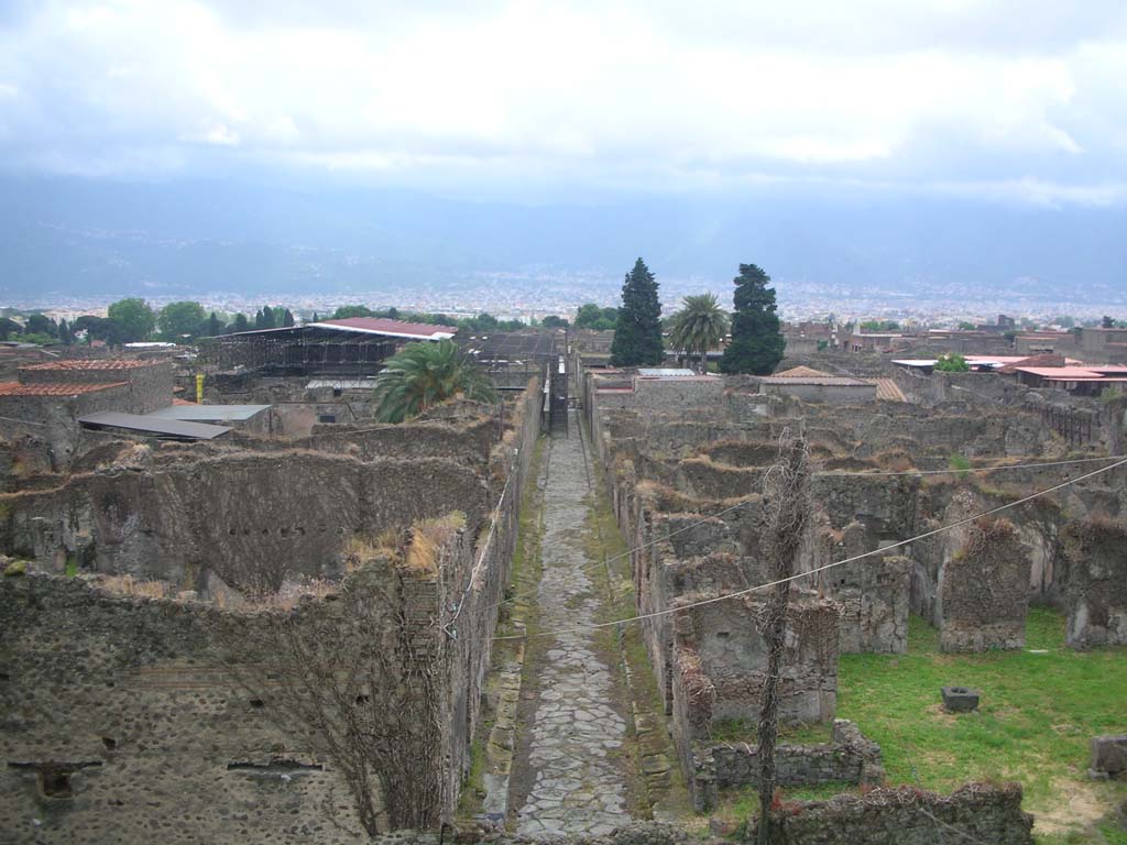 Vicolo del Labirinto, Pompeii. May 2010. 
Looking south from Tower X, with VI.15 on left, and VI.11.19/20 on right. Photo courtesy of Ivo van der Graaff.
