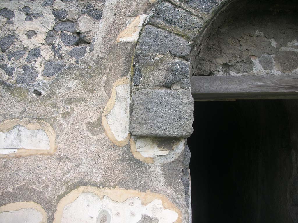 Tower X, Pompeii. May 2010. Detail on west side of doorway. Photo courtesy of Ivo van der Graaff.