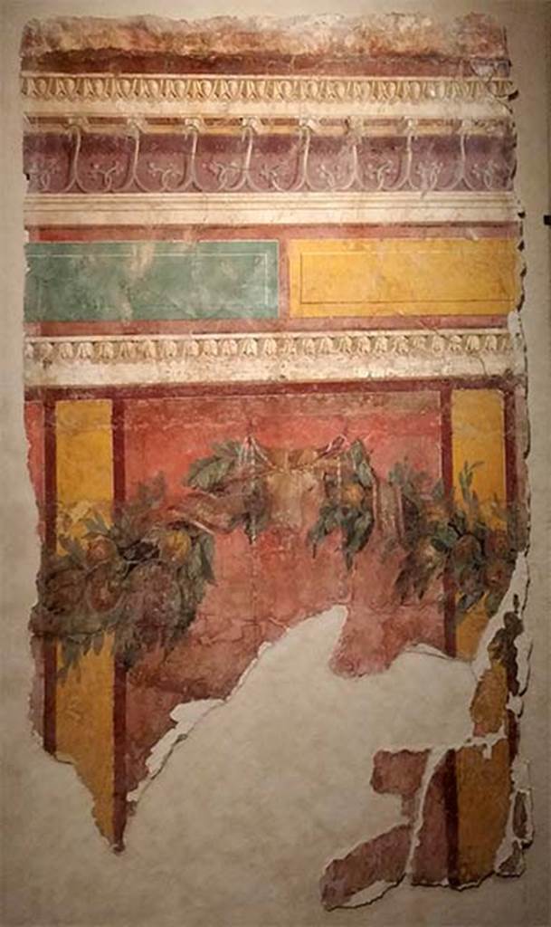 Villa of P. Fannius Synistor at Boscoreale. Room L, tablinum, east wall. 
Panel with garland, bucranium, red panels with yellow dividing bars, yellow and green blocks with cornice above. 
Now in the Muse de Picardie, Amiens, France.
See http://amiens.fr/votre_vie_quotidienne/vie_culturelle/musees_damiens/musee_de_picardie.html
