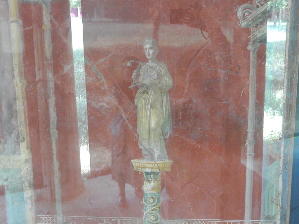 Complesso dei triclini in località Moregine a Pompei. May 2018. Triclinium A, west wall. 
Terpsichore the Muse of dance and chorus with a cithara.
Photo courtesy of Buzz Ferebee.

