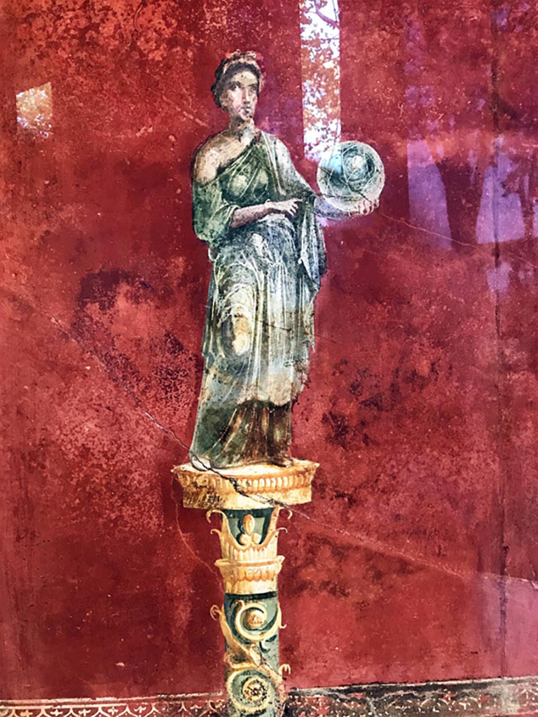 Complesso dei triclini in località Moregine a Pompei. December 2019. 
Triclinium A, east wall. Urania the muse of astronomy with a globe. Photo courtesy of Giuseppe Ciaramella.
