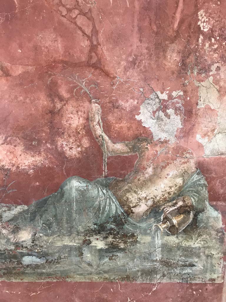 Complesso dei triclini in località Moregine a Pompei. September 2015.
Triclinium C, east wall on display in Pompeii Palaestra. 
Figure dressed in green, possibly Polyhymnia the muse of hymns and sacred poetry, or perhaps a maenad with bacchic attributes.

