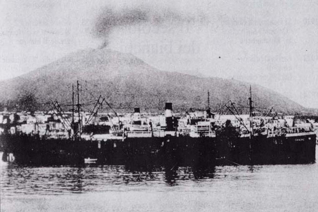 Vesuvius Eruption 1903 seen smoking from port of Torre Annunziata.