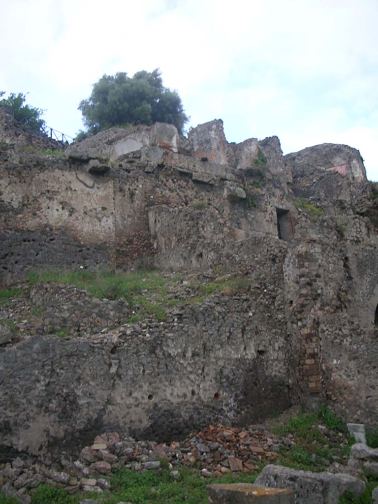 VIII.2.A, on left, VIII.2.1, on right, Pompeii. May 2010. 
Looking north towards detail of wall separating properties. Photo courtesy of Ivo van der Graaff.
