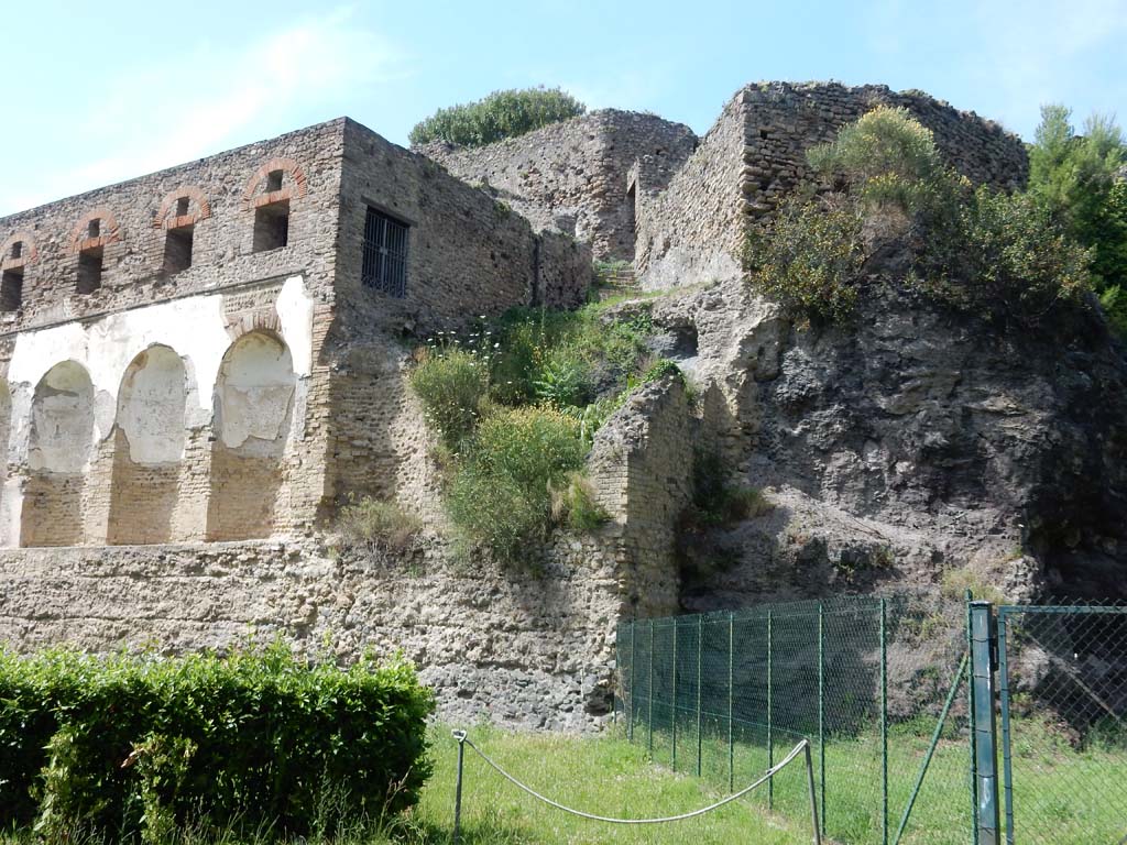 VIII.2.20 Pompeii. June 2019. Rear of Sarno baths, east end. VIII.2.21, on right.
Photo courtesy of Buzz Ferebee.
