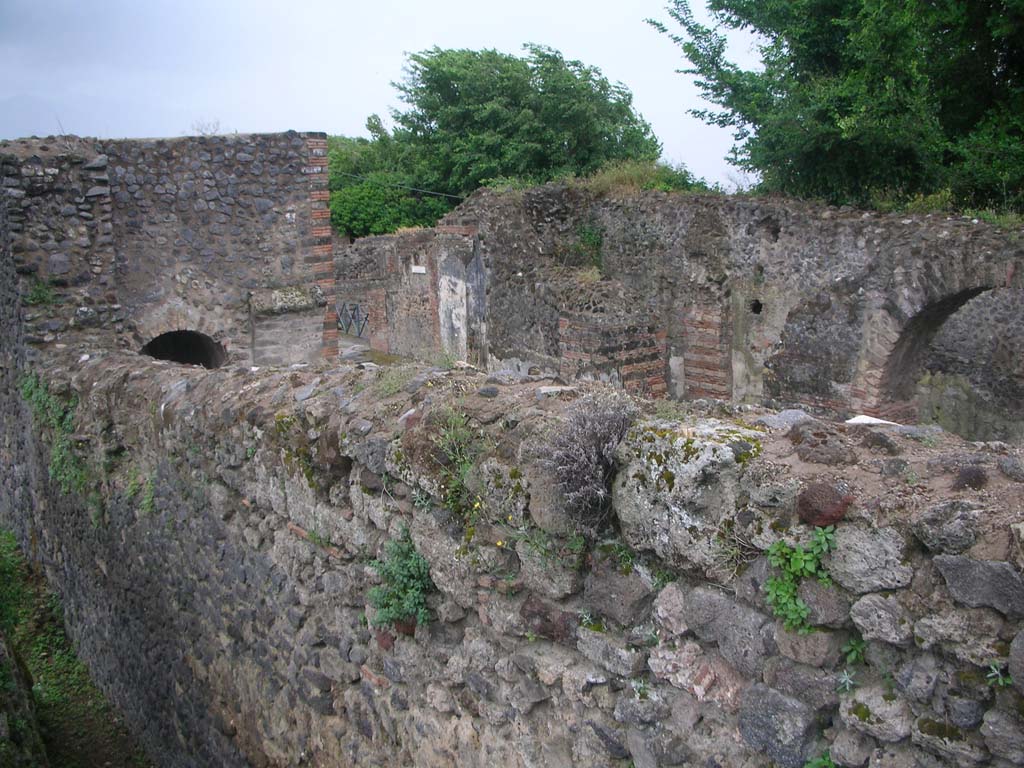 City Wall in north-west corner, Pompeii. May 2010. 
Looking south-west from top of wall, across Herculaneum Gate. Photo courtesy of Ivo van der Graaff.

