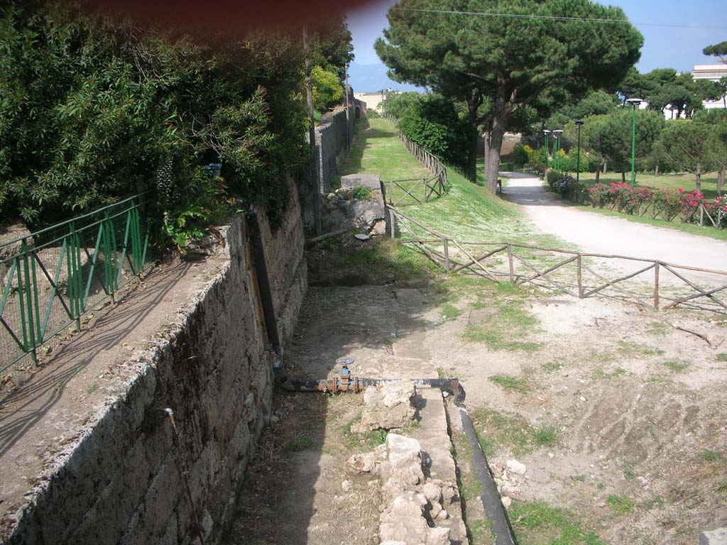 Looking east along City Walls, Pompeii. May 2010. Looking east towards Tower V, upper centre. Photo courtesy of Ivo van der Graaff.