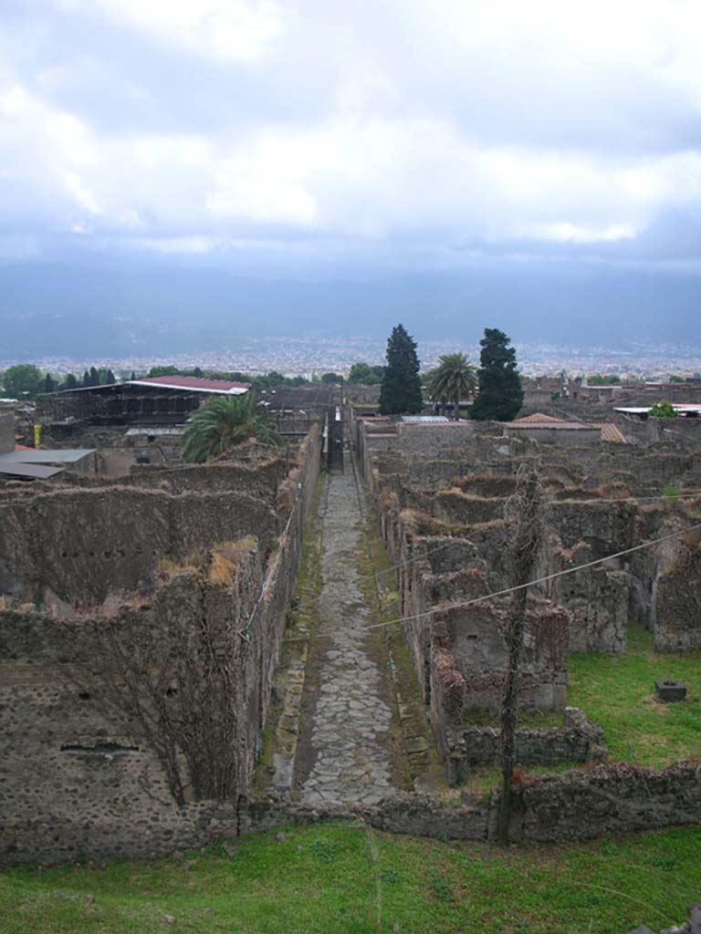 Vicolo del Labirinto, Pompeii. May 2010. 
Looking south from Tower X, with VI.15 on left, and VI.11 on right. Photo courtesy of Ivo van der Graaff.


