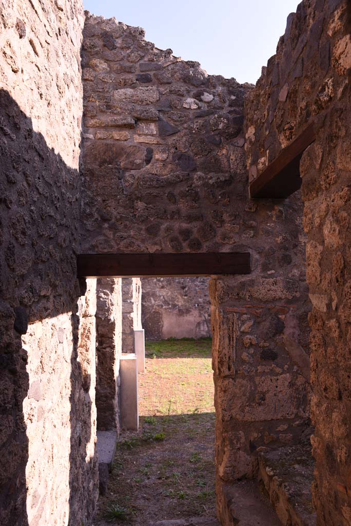 I.4.25/I.4.5 Pompeii. October 2019. 
Looking south in Corridor 13A, or unnumbered corridor on north side of room 13.
Foto Tobias Busen, ERC Grant 681269 DCOR.
